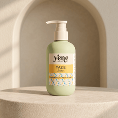 Yazie Shampoo by Yene Hair in a sage green pump bottle on a neutral stone background
